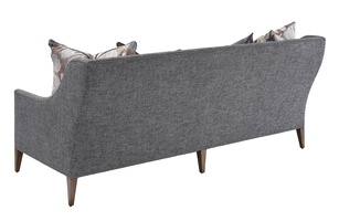 Olinda&nbsp;Sofa&nbsp;shown with:Built-to-the-floor base with exposed legs in Latte&nbsp;finishGunmetal nailhead frame trim