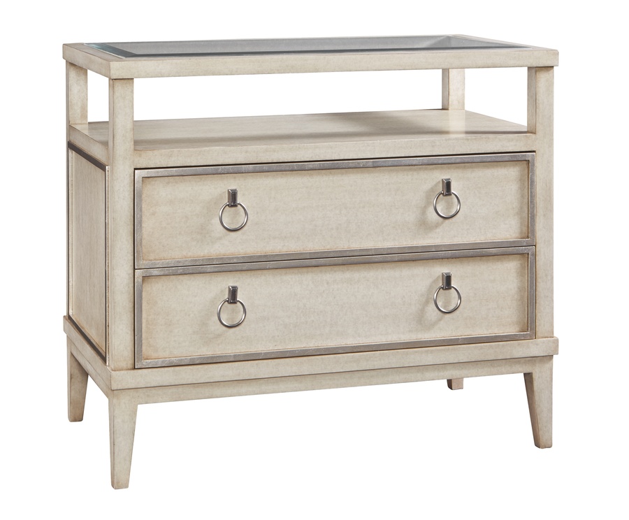 Palo Alto Nightstand shown with:Dapple finishCashmere&nbsp;Silver Leaf finish trimClear glass top with beveled edgeAntique Nickel ring pull
Selection of fabrics, leathers, wood, mirror, or glass available for panel insets