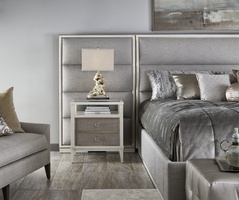 Palo Alto Nightstand shown with:Ensemble&nbsp;finishCashmere&nbsp;Silver Leaf finish trimClear glass top with beveled edgePolished Nickel square knob pull
Selection of fabrics, leathers, wood, mirror, or glass available for panel insets