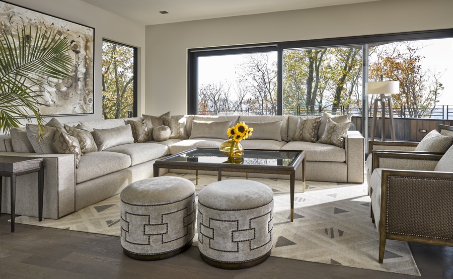 Carlton Ottoman&nbsp;shown with:Wood base in Dark Bay finishMottled nailhead frame trim in Square&nbsp;Link pattern