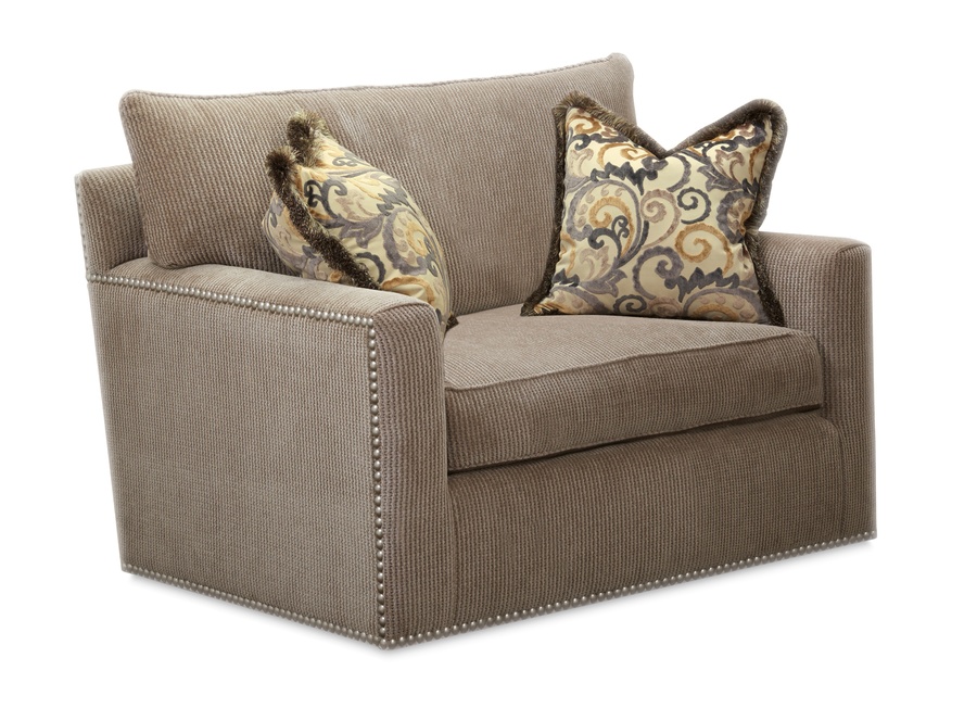 Santa Barbara Chair&nbsp;shown with:Knife Edge Back PillowBoxed straight cushionTrack&nbsp;ArmBuilt-to-the-floor baseNailhead frame trim