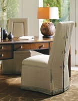 Justina Side Chair shown with:Tight seat and backMerengue nailhead frame trimDeep skirt with split back and button detailContrast 2&frac12;" band and decorative tape at bottom of skirtCastersAccessory tassel ties